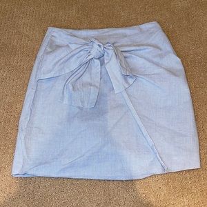 blue and white striped skirt with tie in front